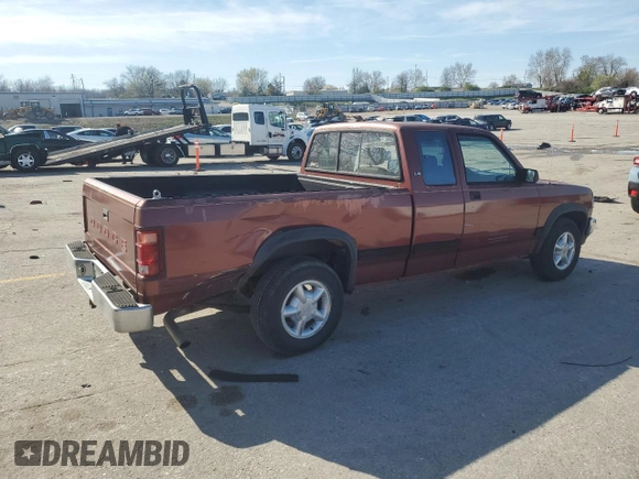 1992 Dodge Dakota z VIN 1B7GL23YXNS633409, wystawiony jako Copart lot #51067775 z przebiegiem 153 174 mil mil oraz Szkoda całkowita • Salvage title. Historia ofert i sprzedaży dostępna na DreamBid. Obrazek 3.
