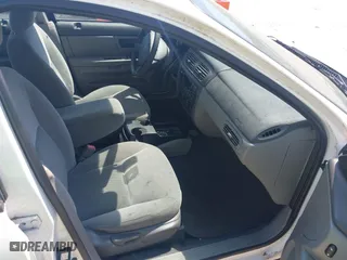 2006 Ford Taurus SE with VIN 1FAHP532X6A257510, listed as a IAAI auction lot 41892422 with 130,633 mi miles. Bid and sale history available at carsss.com. Image 5.