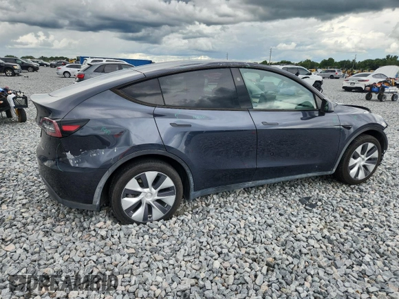 2024 Tesla Model Y Long Range with VIN 7SAYGDEE9RA255688, listed as a Copart auction lot 58918665 with 21,302 mi miles and Salvage title. Bid and sale history available at DreamBid. Image 3.