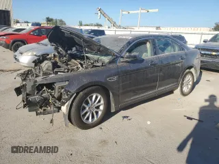 2015 Ford Taurus SE with VIN 1FAHP2D80FG116704, listed as a Copart auction lot 73571034 with 85,665 mi miles and Salvage Title. Bid and sale history available at carsss.com. Image 1.