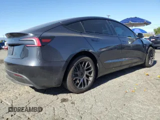 2025 Tesla Model 3 Long Range with VIN 5YJ3E1EA1SF878806, listed as a Copart auction lot 50427005 with 9,790 mi miles and Salvage Title. Bid and sale history available at DreamBid. Image 3.