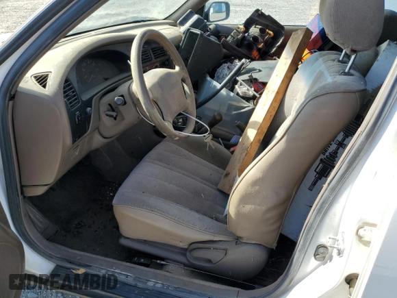 1996 Toyota Camry DX with VIN JT2BG12K7T0351784, listed as a Copart auction lot 52815345 with 303,537 mi miles and Clean Title. Bid and sale history available at carsss.com. Image 7.