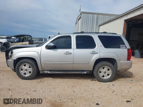 2011 Chevrolet Tahoe LT with VIN 1GNSCBE08BR369781, listed as a IAAI auction lot 42207208 with 162,038 mi miles and . Bid and sale history available at DreamBid. Image 14.
