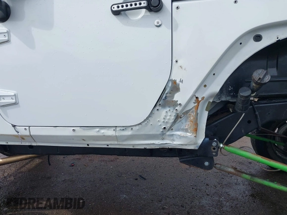 2013 Jeep Wrangler Sport with VIN 1C4AJWAG8DL601399, listed as a IAAI auction lot 42186399 with 130,195 mi miles and . Bid and sale history available at DreamBid. Image 18.