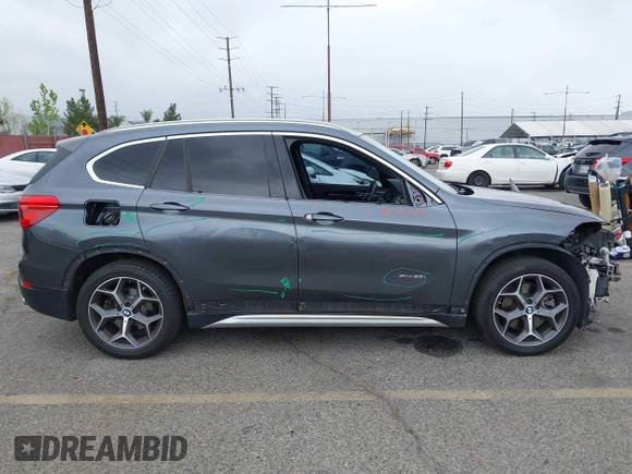 2016 BMW X1 xDrive28i with VIN WBXHT3C32GP886084, listed as a IAAI auction lot 41895754 with 85,662 mi miles and . Bid and sale history available at DreamBid. Image 14.