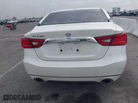 2016 Nissan Maxima SL with VIN 1N4AA6AP3GC448957, listed as a IAAI auction lot 41734717 with 128,687 mi miles and . Bid and sale history available at DreamBid. Image 16.