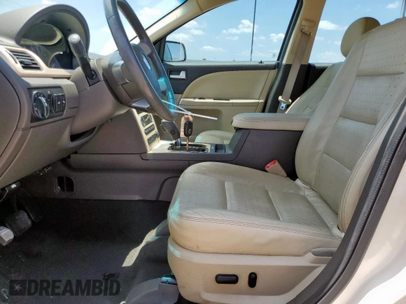 2009 Mercury Sable with VIN 1MEHM40W69G633236, listed as a Copart auction lot 61373655 with 95,506 mi miles and Salvage title. Bid and sale history available at DreamBid. Image 7.