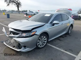 2019 Toyota Camry LE with VIN 4T1B11HK7KU803624, listed as a IAAI auction lot 41589107 with 169,863 mi miles and . Bid and sale history available at DreamBid. Image 17.