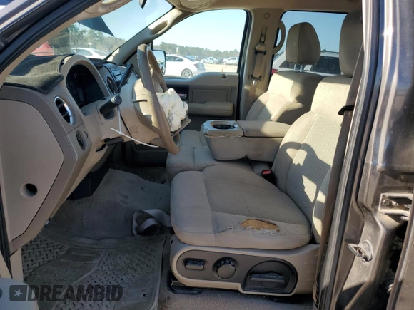 2005 Ford F-150 XLT with VIN 1FTRW12W65KD95732, listed as a Copart auction lot 48598155 with 195,368 mi miles and Salvage Title. Bid and sale history available at DreamBid. Image 7.
