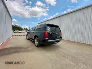 2015 Chevrolet Suburban LT with VIN 1GNSKJKC3FR153922, listed as a Copart auction lot 64337945 with 238,441 mi miles and Clean title. Bid and sale history available at DreamBid. Image 3.
