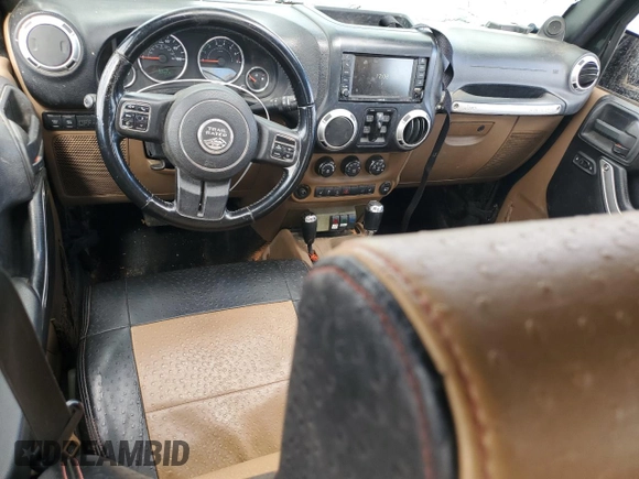 2012 Jeep Wrangler Unlimited Rubicon с VIN 1C4HJWFG4CL103531, выставлен на аукционе Copart как лот 48131665 с пробегом 183 234 миль миль и Списание • Salvage title. История ставок и продаж доступна на DreamBid. Изображение 8.