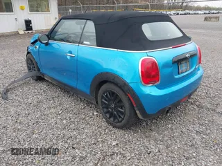 2016 MINI Convertible with VIN WMWWG5C52G3A81084, listed as a IAAI auction lot 41954333 with 78,558 mi miles and . Bid and sale history available at DreamBid. Image 3.