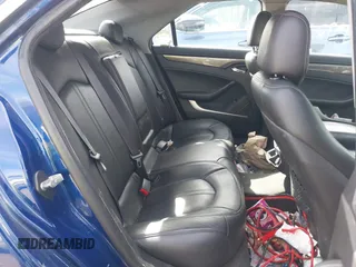 2013 Cadillac CTS Luxury with VIN 1G6DG5E53D0104554, listed as a IAAI auction lot 41824292 with 189,280 mi miles and . Bid and sale history available at DreamBid. Image 8.