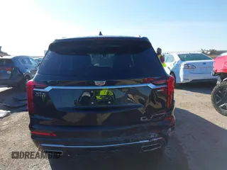 2022 Cadillac XT6 Premium Luxury with VIN 1GYKPCRS1NZ121711, listed as a IAAI auction lot 41149624 with 62,887 mi miles and . Bid and sale history available at DreamBid. Image 16.