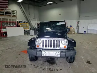 2013 Jeep Wrangler Sahara z VIN 1C4AJWBG5DL566559, wystawiony jako Copart lot #54823405 z przebiegiem 134 099 mil mil oraz Szkoda całkowita • Salvage title. Historia ofert i sprzedaży dostępna na DreamBid. Obrazek 13.
