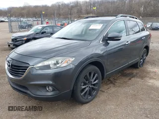 2015 Mazda CX-9 Grand Touring with VIN JM3TB3DV1F0465966, listed as a IAAI auction lot 42049749 with 74,470 mi miles and . Bid and sale history available at DreamBid. Image 2.