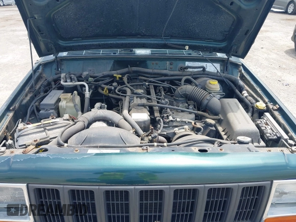 1999 Jeep Cherokee SE with VIN 1J4FT28S2XL669523, listed as a IAAI auction lot 42429202 with 83,250 mi miles and . Bid and sale history available at DreamBid. Image 10.
