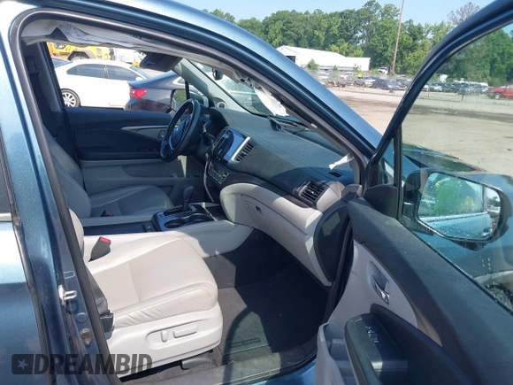 2018 Honda Pilot EX-L with VIN 5FNYF6H52JB050535, listed as a IAAI auction lot 42576721 with 99,280 mi miles and . Bid and sale history available at DreamBid. Image 5.