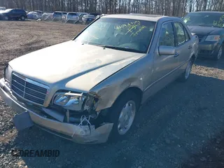 1997 Mercedes-Benz C with VIN WDBHA23E6VF506602, listed as a IAAI auction lot 42042704 with Not provided miles and . Bid and sale history available at DreamBid. Image 2.