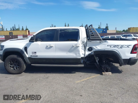 2021 Ram 1500 TRX with VIN 1C6SRFU9XMN905260, listed as a IAAI auction lot 41745910 with 69,565 mi miles and . Bid and sale history available at DreamBid. Image 14.