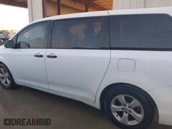 2015 Toyota Sienna L with VIN 5TDZK3DC5FS657115, listed as a IAAI auction lot 42109678 with 176,995 mi miles. Bid and sale history available at carsss.com. Image 14.