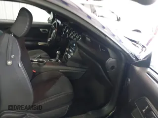 2021 Ford Mustang EcoBoost z VIN 1FA6P8TH4M5126706, wystawiony jako IAAI lot #42465164 z przebiegiem 49 795 mil mil oraz . Historia ofert i sprzedaży dostępna na DreamBid. Obrazek 5.