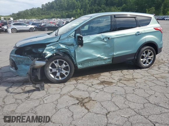 2013 Ford Escape SEL z VIN 1FMCU9H98DUC56048, wystawiony jako Copart lot #61613085 z przebiegiem 198 102 mil mil oraz Szkoda całkowita • Salvage title. Historia ofert i sprzedaży dostępna na DreamBid. Obrazek 1.