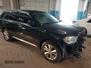 2013 Dodge Durango Crew z VIN 1C4RDJDG2DC670338, wystawiony jako IAAI lot #42434949 z przebiegiem 176 202 mil mil oraz . Historia ofert i sprzedaży dostępna na DreamBid. Obrazek 1.
