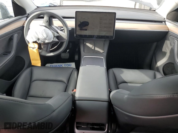 2024 Tesla Model Y Long Range z VIN 7SAYGDEE4RA251337, wystawiony jako Copart lot #59844555 z przebiegiem 16 011 mil mil oraz Szkoda całkowita • Salvage title. Historia ofert i sprzedaży dostępna na DreamBid. Obrazek 8.
