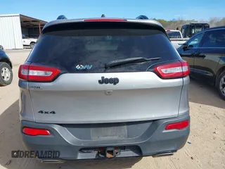 2016 Jeep Cherokee Sport with VIN 1C4PJMAS5GW348869, listed as a IAAI auction lot 41672622 with 166,330 mi miles. Bid and sale history available at carsss.com. Image 17.