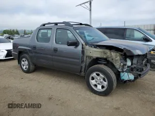 2011 Honda Ridgeline RT z VIN 5FPYK1F26BB451960, wystawiony jako Copart lot #53733215 z przebiegiem 202 556 mil mil oraz Szkody całkowita. Historia ofert i sprzedaży dostępna na DreamBid. Obrazek 4.