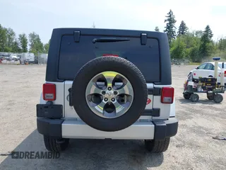 2012 Jeep Wrangler Unlimited Altitude with VIN 1C4HJWEG2CL140059, listed as a IAAI auction lot 42433563 with 189,868 mi miles and . Bid and sale history available at DreamBid. Image 16.