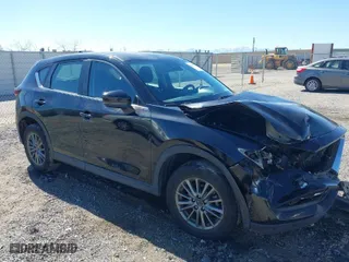 2017 Mazda CX-5 Sport with VIN JM3KFBBL2H0144792, listed as a IAAI auction lot 41654031 with 77,107 mi miles. Bid and sale history available at carsss.com. Image 1.