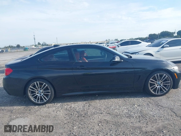 2015 BMW 4 Series 428i with VIN WBA3N3C56FK233866, listed as a IAAI auction lot 41983330 with 218,017 mi miles and . Bid and sale history available at DreamBid. Image 13.
