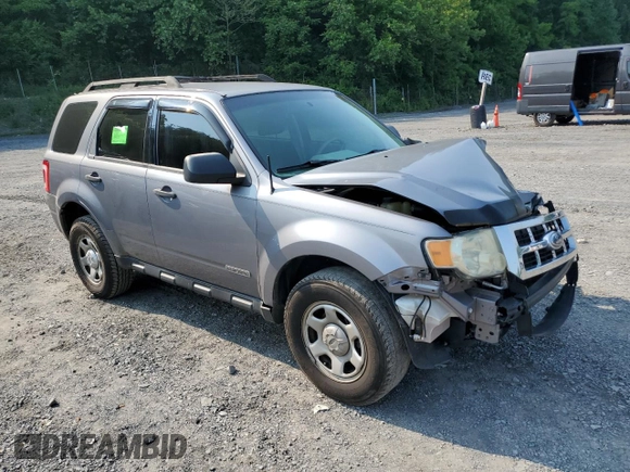 2008 Ford Escape XLS with VIN 1FMCU02Z18KE11979, listed as a Copart auction lot 60212165 with 239,177 mi miles and Salvage title. Bid and sale history available at DreamBid. Image 4.