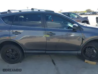 2018 Toyota RAV4 LE with VIN 2T3ZFREV4JW412661, listed as a IAAI auction lot 41781229 with 140,131 mi miles. Bid and sale history available at carsss.com. Image 13.