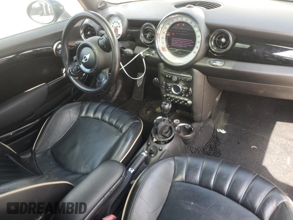 2012 MINI Hardtop S with VIN WMWSV3C50CTY18637, listed as a Copart auction lot 57771015 with 103,402 mi miles and Salvage title. Bid and sale history available at DreamBid. Image 8.