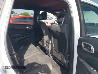 2014 Jeep Grand Cherokee Laredo with VIN 1C4RJEAG3EC125478, listed as a IAAI auction lot 41938499 with 167,588 mi miles and . Bid and sale history available at DreamBid. Image 8.