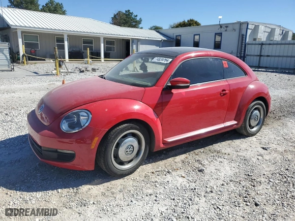 2013 Volkswagen Beetle Coupe 2.5L with VIN 3VWJX7AT4DM638334, listed as a Copart auction lot 74824764 with 76,740 mi miles and Clean Title. Bid and sale history available at carsss.com. Image 1.