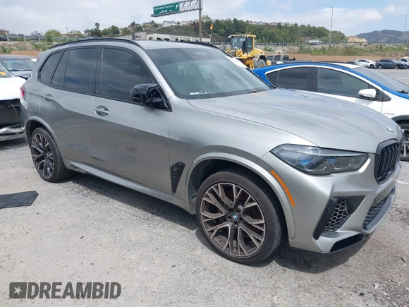 2022 BMW X5 M with VIN 5YMJU0C00N9M59253, listed as a IAAI auction lot 41476833 with 27,813 mi miles. Bid and sale history available at carsss.com. Image 1.