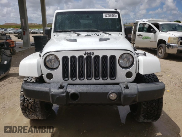 2015 Jeep Wrangler Unlimited Wrangler X with VIN 1C4BJWEG6FL614671, listed as a Copart auction lot 62286095 with 94,928 mi miles and Salvage title. Bid and sale history available at DreamBid. Image 5.
