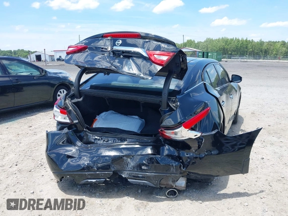 2016 Nissan Maxima Platinum with VIN 1N4AA6AP1GC901425, listed as a IAAI auction lot 42526689 with 118,804 mi miles and . Bid and sale history available at DreamBid. Image 6.