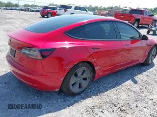 2022 Tesla Model 3 with VIN 5YJ3E1EA7NF152114, listed as a IAAI auction lot 42097399 with 96,726 mi miles. Bid and sale history available at carsss.com. Image 4.