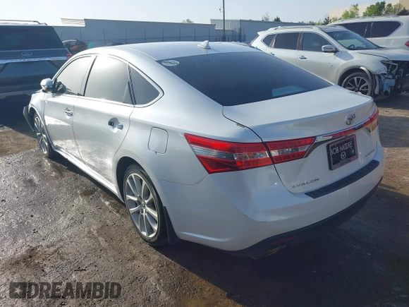 2013 Toyota Avalon XLE with VIN 4T1BK1EB8DU065806, listed as a IAAI auction lot 42043614 with 197,049 mi miles and . Bid and sale history available at DreamBid. Image 3.