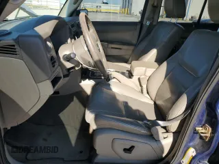 2006 Jeep Commander with VIN 1J8HH48K06C179567, listed as a Copart auction lot 88556105 with 196,696 mi miles and Salvage title. Bid and sale history available at DreamBid. Image 7.