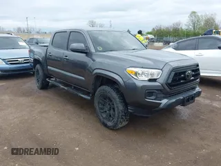 2021 Toyota Tacoma SR with VIN 3TYAX5GNXMT013781, listed as a IAAI auction lot 42059661 with 41,702 mi miles and . Bid and sale history available at DreamBid. Image 1.