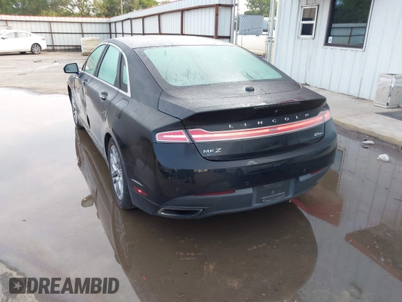 2014 Lincoln MKZ z VIN 3LN6L2G9XER803130, wystawiony jako IAAI lot #42372587 z przebiegiem 84 448 mil mil oraz . Historia ofert i sprzedaży dostępna na DreamBid. Obrazek 3.