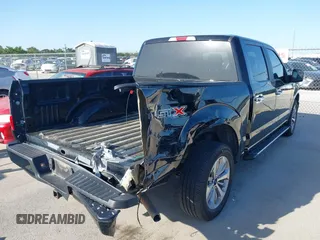 2018 Ford F-150 XL with VIN 1FTEW1C58JKC02382, listed as a IAAI auction lot 42010568 with 124,757 mi miles and . Bid and sale history available at DreamBid. Image 4.