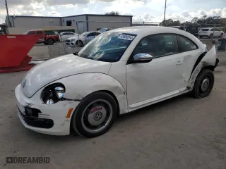 2012 Volkswagen Beetle 2.5L PZEV with VIN 3VWJP7ATXCM606633, listed as a Copart auction lot 85889244 with 80,652 mi miles and Salvage Title. Bid and sale history available at carsss.com. Image 1.