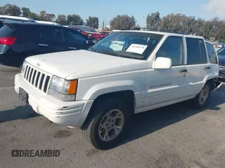 1998 Jeep Grand Cherokee with VIN 1J4FX78S2WC281501, listed as a IAAI auction lot 42140170 with 177,575 mi miles and . Bid and sale history available at DreamBid. Image 2.